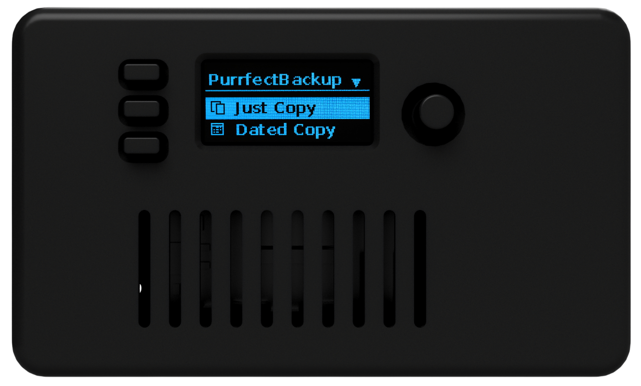 Close-up of portable backup device with SD card and USB drive connected